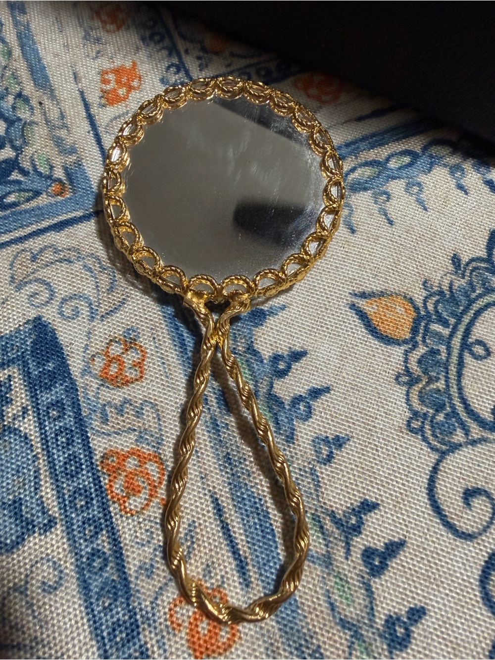Preloved: gold-toned hand mirror is consistent with vintage Limoges